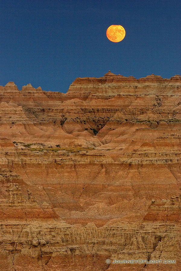 The full moon rises above the Badlands. - Badlands NP Photography