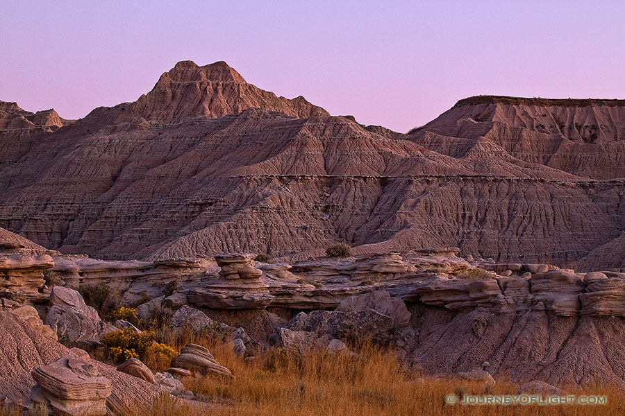 As darkness approaches Toadstool Geologic Park in western Nebraska the formations begin to take on an otherworldly appearance. - Toadstool Photography