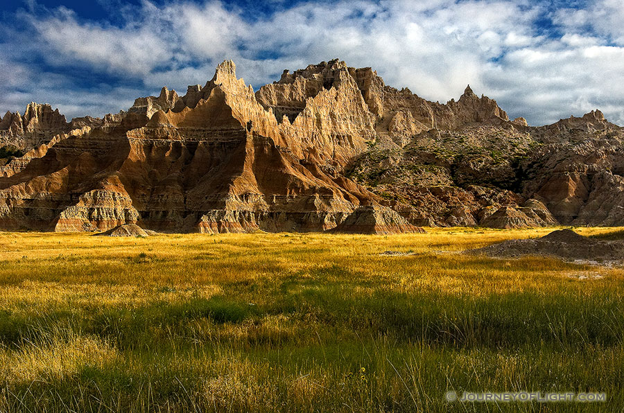 The early morning light illuminates the unusual formations in Badlands National Park, South Dakota. - Badlands NP Photography