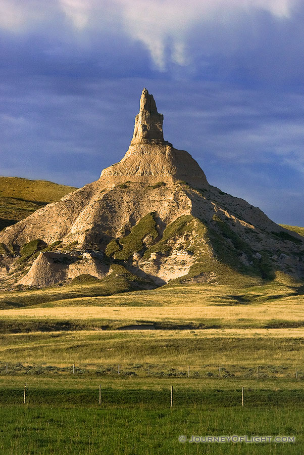 Chimney Rock, long a symbol of the state of Nebraska.  I captured this photograph as the warm morning light shone across the plains. - Nebraska Photography