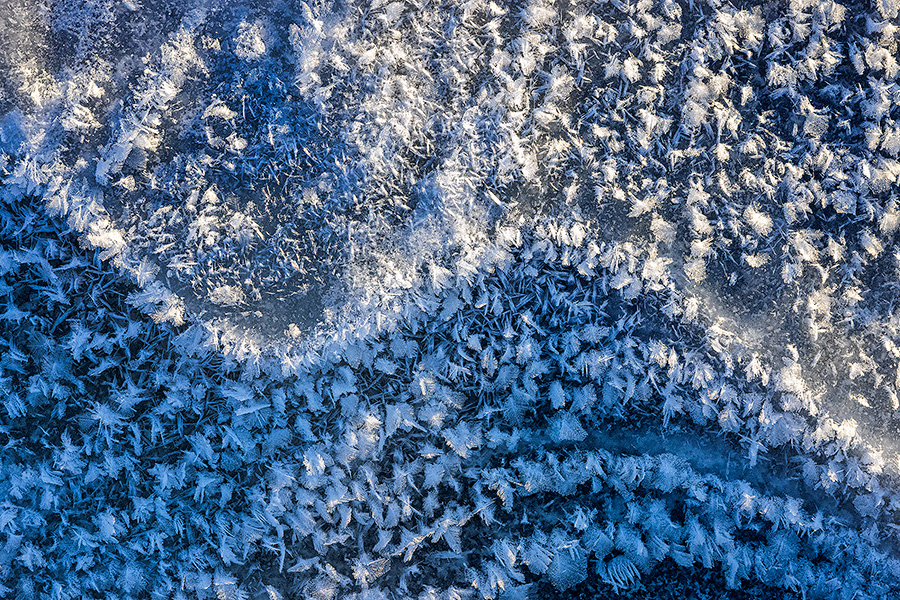 An abstract composition of frost on the ice at Shadow Lake, Nebraska. - Nebraska Photography