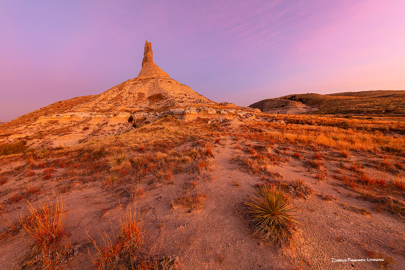 A scenic landscape Nebraska photograph of a sunset and Chimney Rock in western Nebraska. - Nebraska Picture
