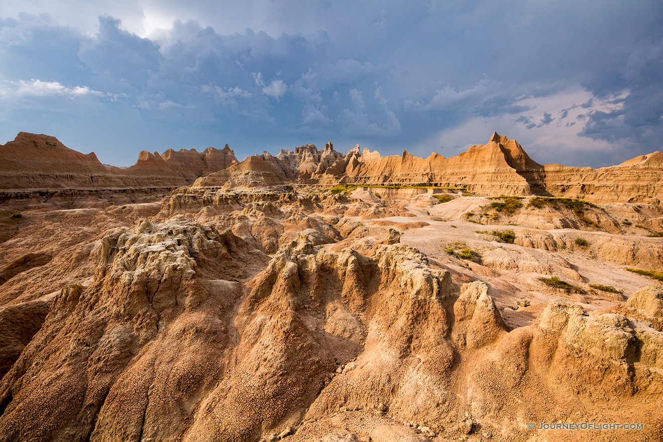 A photograph of an afternoon thunderstorm moving through the Badlands National Park, South Dakota. - South Dakota Picture