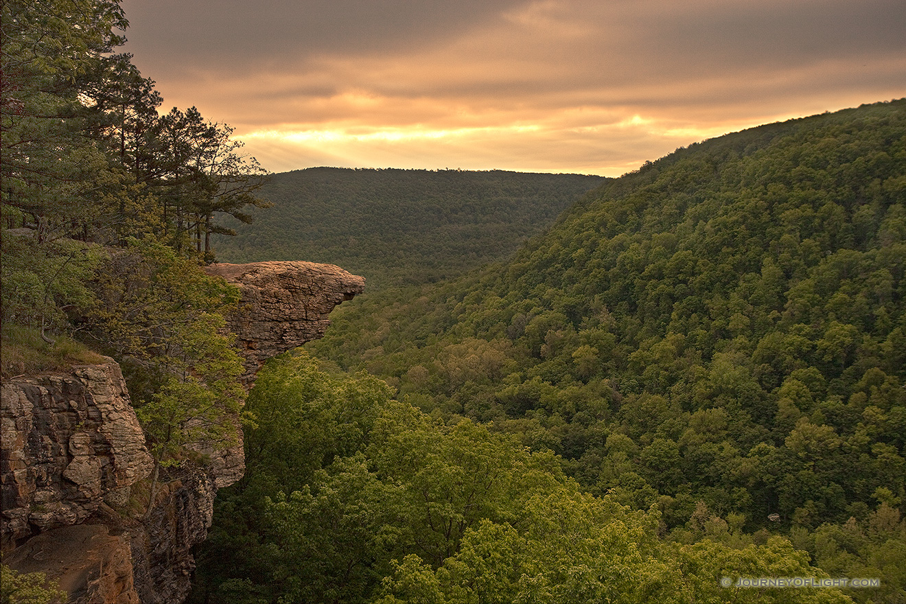 Rays of light illuminate the Ozarks at Whitaker Point while Hawksbill Crag juts out from the side of the hill.  Hills blanketed in verdant trees can be seen for miles around.</a><p>This image was featured in the 'Traveling the Journey of Light' Photoblog on May 13, 2010.  <a href='http://blog.journeyoflight.com/2010/05/13/a-story-from-the-field-illumination-at-whitaker-point-hawksbill-crag/' target=_blank>Click Here To See the Post</a> - Arkansas Picture