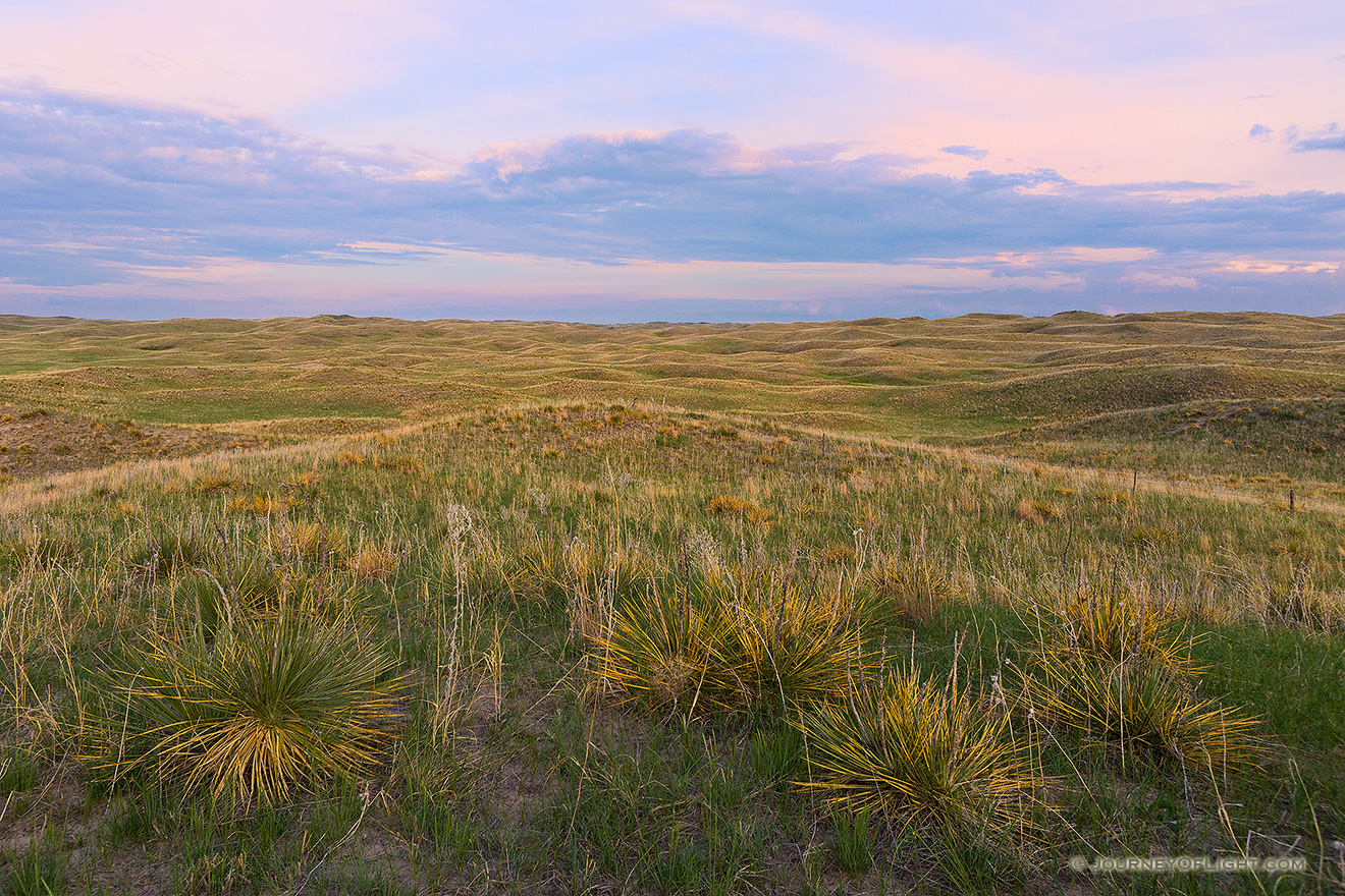As twilight descends, a calm comes over an expanse of the sandhills in Cherry County, Nebraska. - Nebraska Picture
