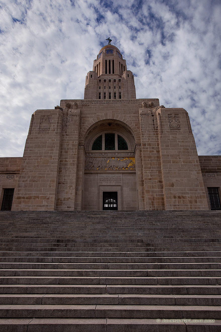 The Nebraska state capitol building in Lincoln, completed in 1932 is built with Indiana limestone and contained several design innovations for the time.  This building houses the only state unicameral type government in the United States. - Lincoln Picture