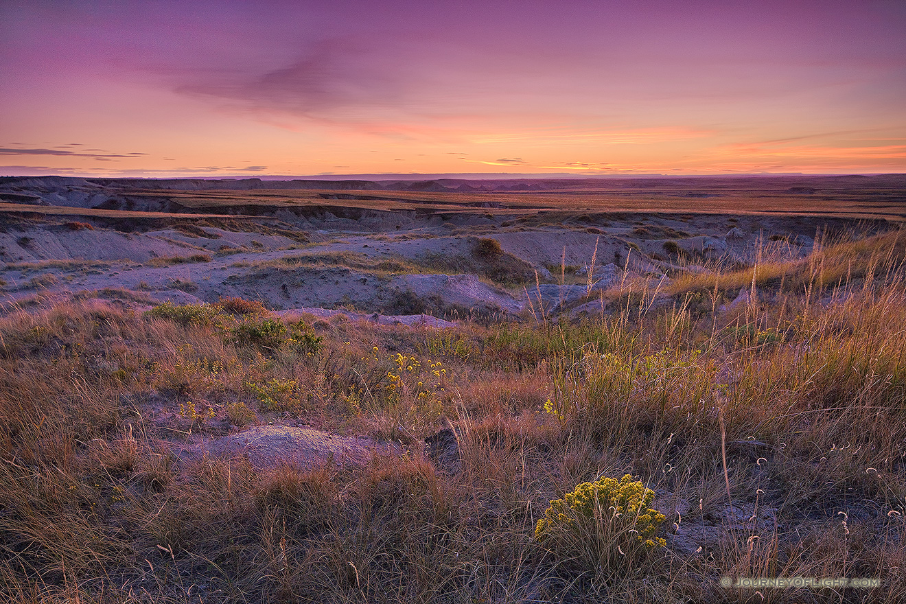 20 minutes past sunset, the very last light of the setting sun gives the prairie off of the Hudson-Meng Trail of the Oglala National Grassland an ethereal glow. - Nebraska Picture