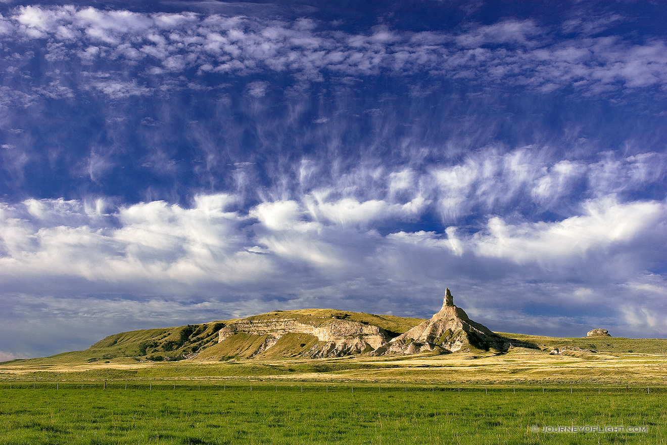 Chimney Rock in Nebraska under whispy clouds on a autumn morning. - Nebraska Picture