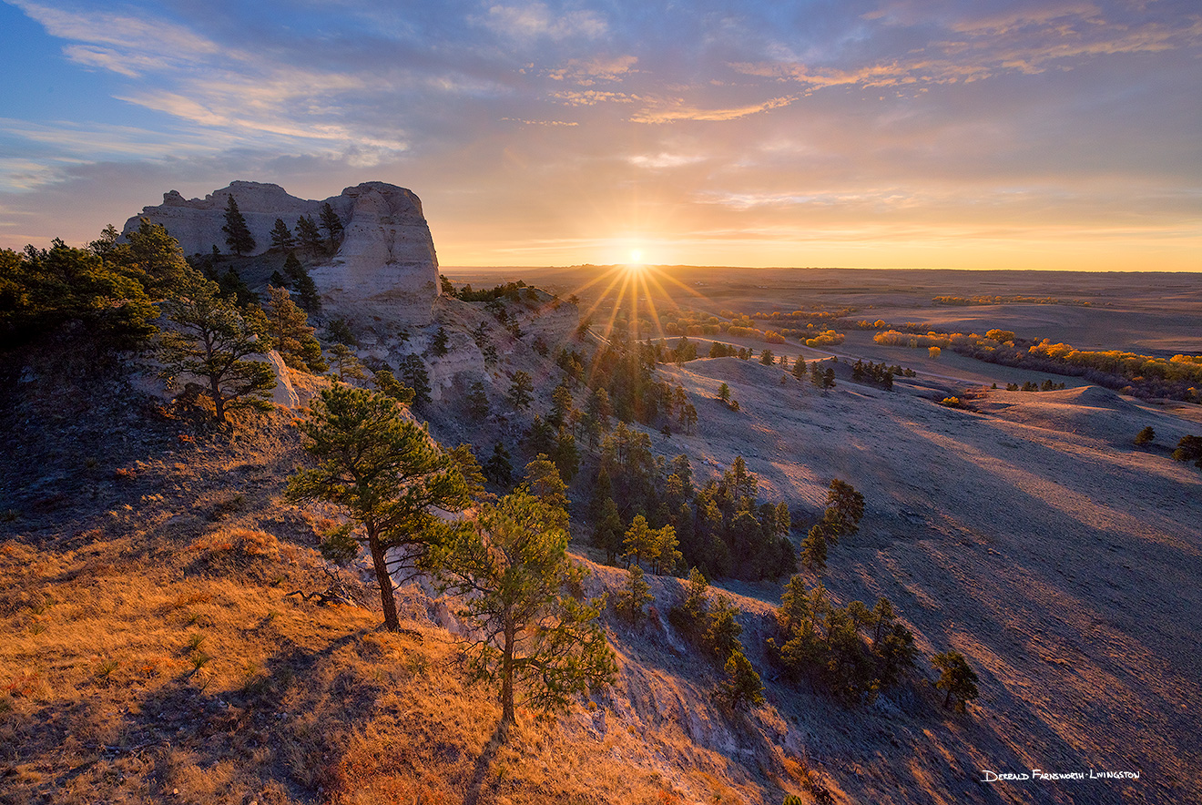 A scenic landscape photograph of a beautiful sunrise over Fort Robinson State Park in Northwestern Nebraska. - Nebraska Picture