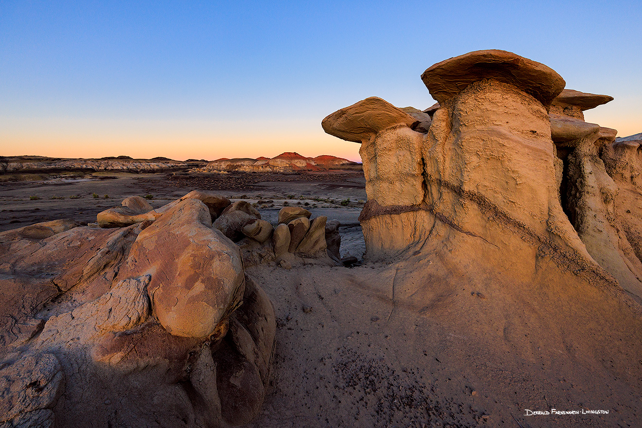 Scenic photograph of a sunrise at Bisti Badlands, New Mexico. - New Mexico Picture