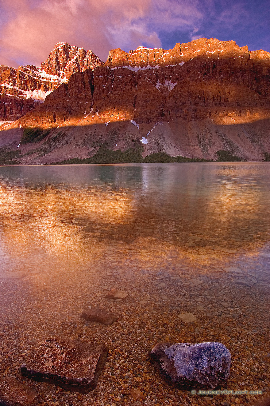 Bow Lake in Banff National Park at sunrise.  I awoke early in order to travel from Canmore to Bow Lake to capture the early sun hitting the mountains over Bow Lake. - Banff Picture