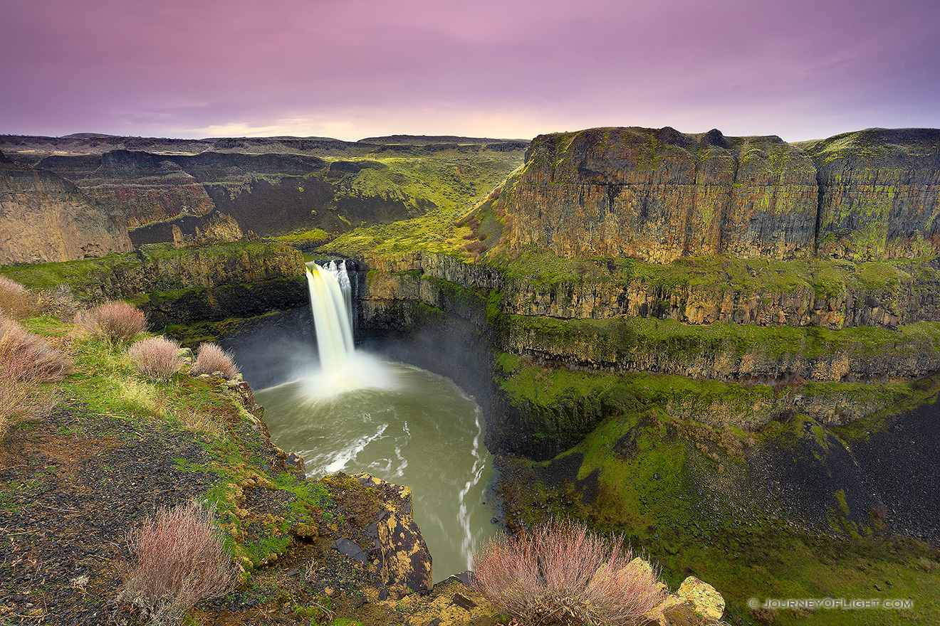 On a cool February evening the beautiful Palouse falls in south central Oregon cascades down almost 200 feet. - Pacific Northwest Picture
